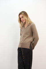 V-neck with lace up detail